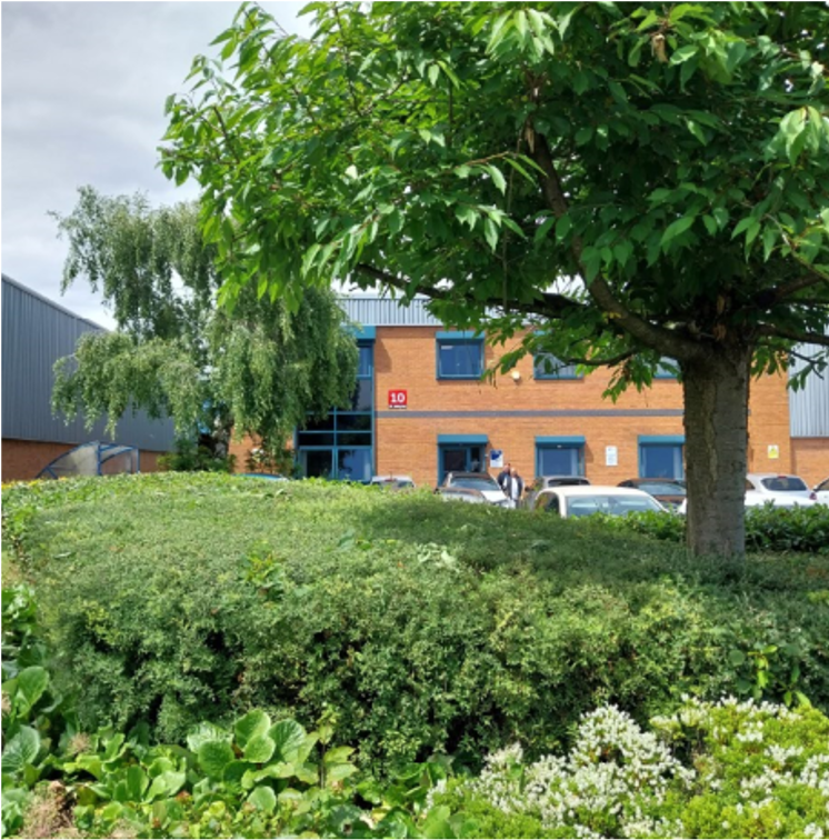 hedges and trees around a business car park
